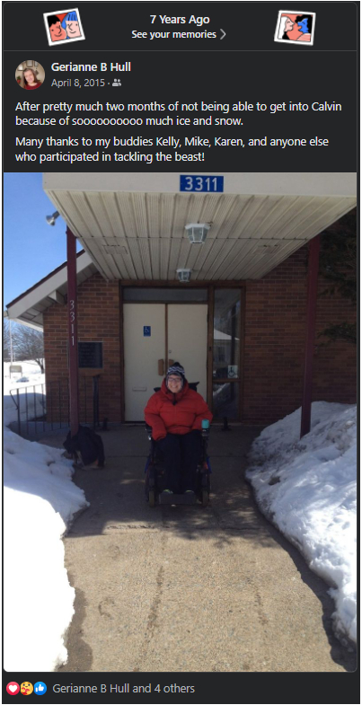 A screenshot of a Facebook memory with Gerianne sitting in her powerchair in front of Calvin Presbyterian Church. There are piles of snow around the entrance. Gerianne is smiling and wearing winter clothing.